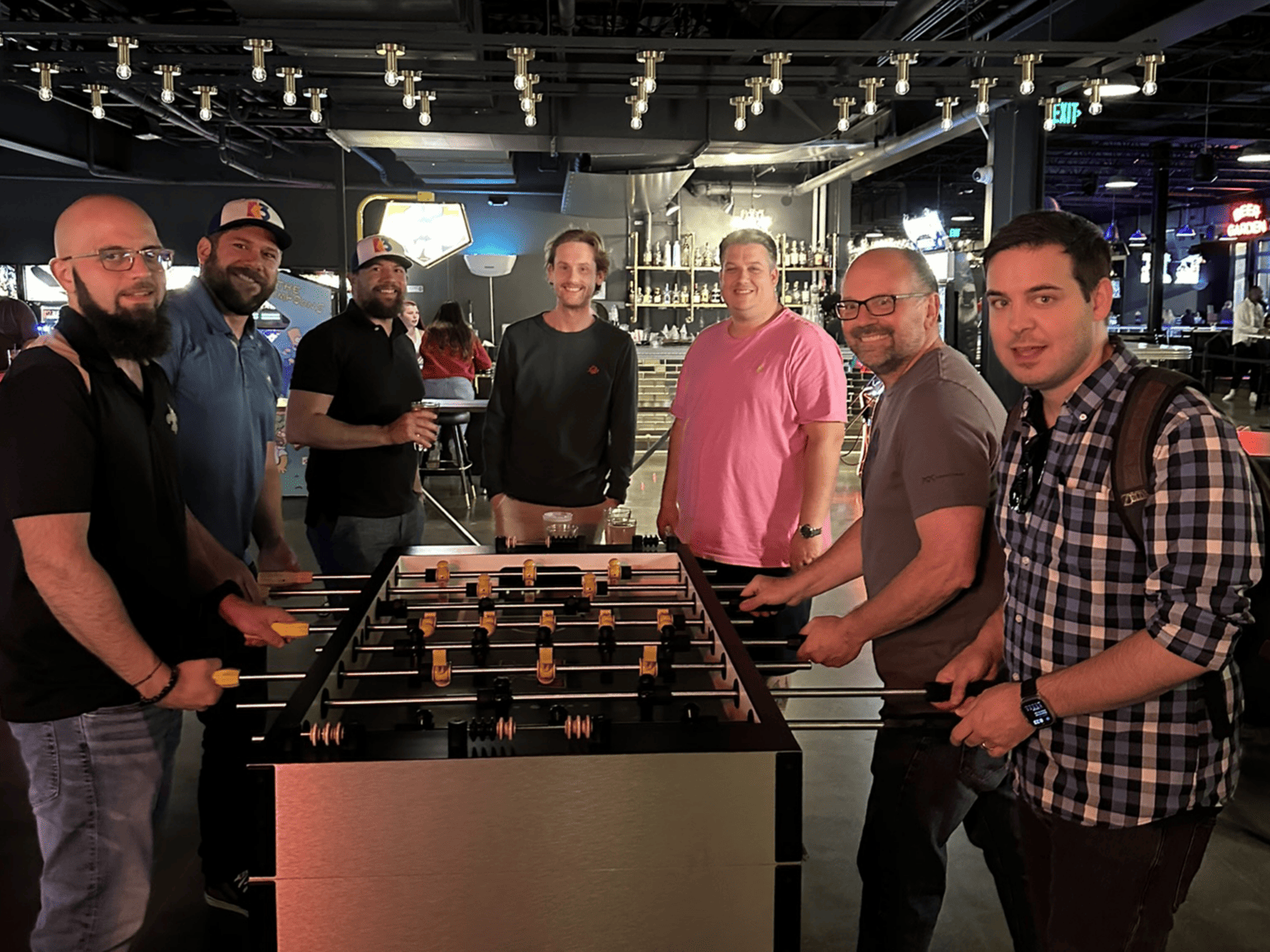 K3 Technology team playing foosball