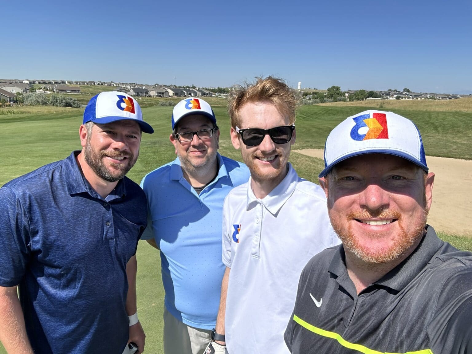 K3 Technology team at golf course